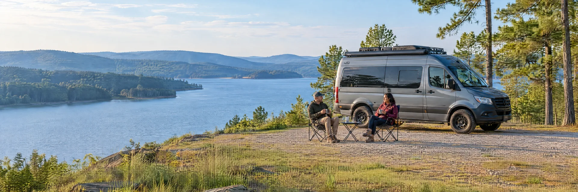 Illustration of campers enjoying morning coffee beside a camper van in a fictional camping setting inspired by Cedar Bluff, AL.