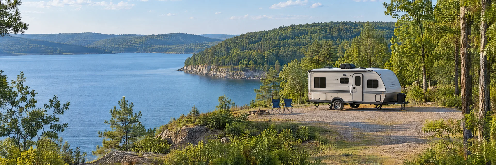 Illustration of a compact travel trailer at a fictional camping setting inspired by Royal, AR.