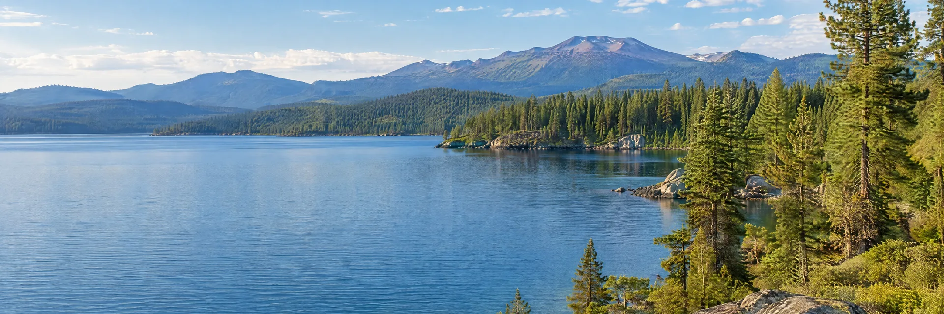 Illustration inspired by Chester, CA: northern California mountain lake, conifer shoreline and distant volcanic-country ridges; no invented peak.
