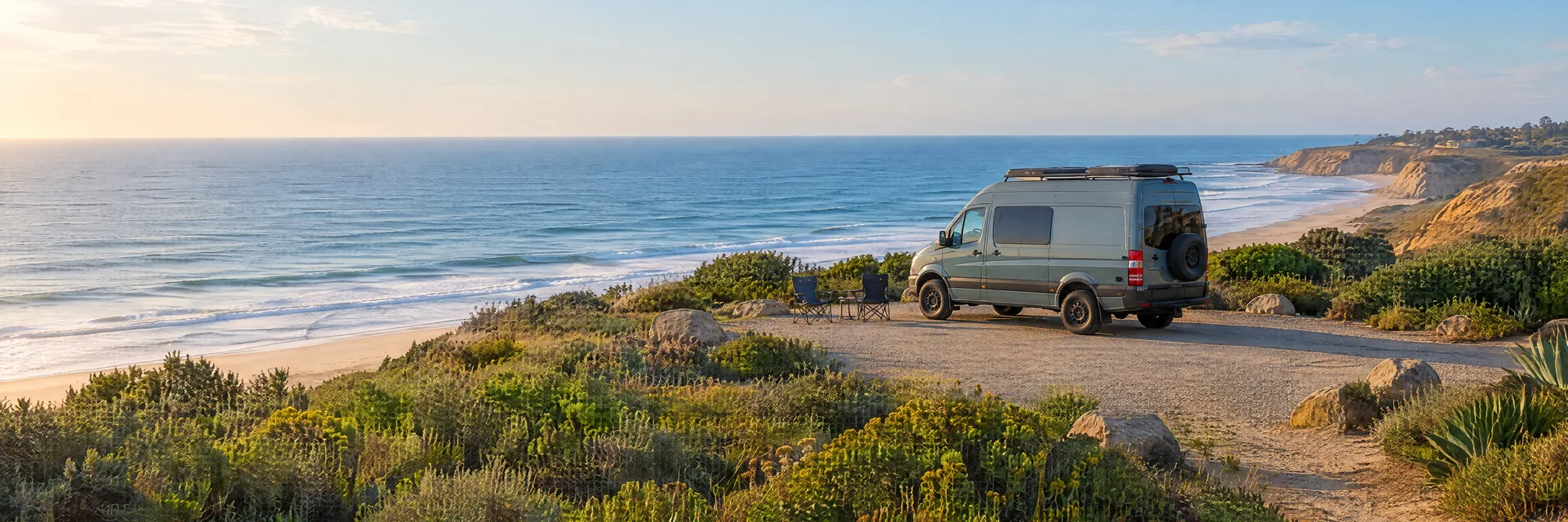 Illustration of a camper van at a fictional camping setting inspired by Encinitas, CA.