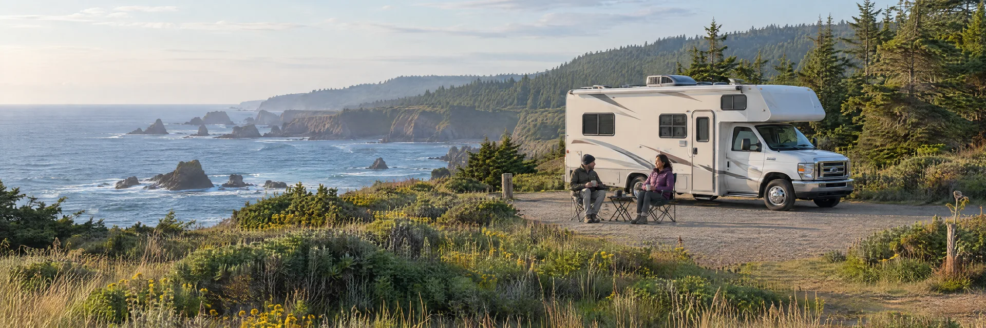 Illustration of campers enjoying morning coffee beside a Class C motorhome in a fictional camping setting inspired by Fort Bragg, CA.