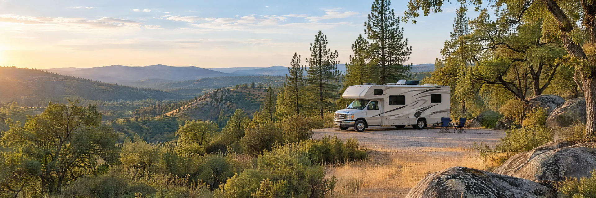 Illustration of a Class C motorhome at a fictional camping setting inspired by Grass Valley, CA.
