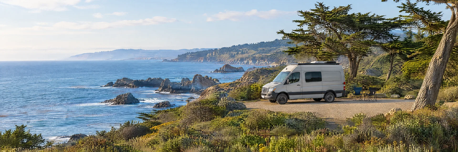 Illustration of a camper van at a fictional camping setting inspired by Monterey, CA.