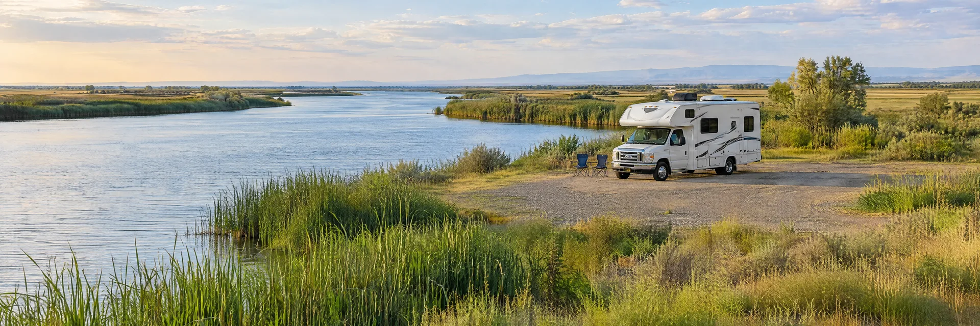 Illustration of a Class C motorhome at a fictional camping setting inspired by Rio Vista, CA.