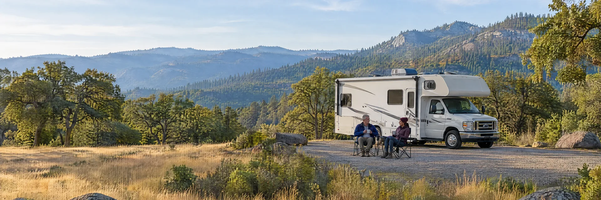 Illustration of campers enjoying morning coffee beside a Class C motorhome in a fictional camping setting inspired by Sonora, CA.