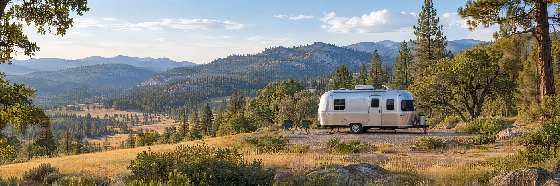 Illustration of a rounded silver travel trailer at a fictional camping setting inspired by Tuolumne, CA.