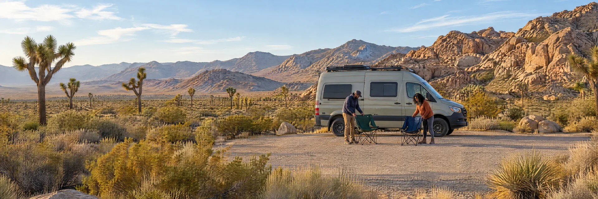 Illustration of campers enjoying setting up camp beside a camper van in a fictional camping setting inspired by Twentynine Palms, CA.