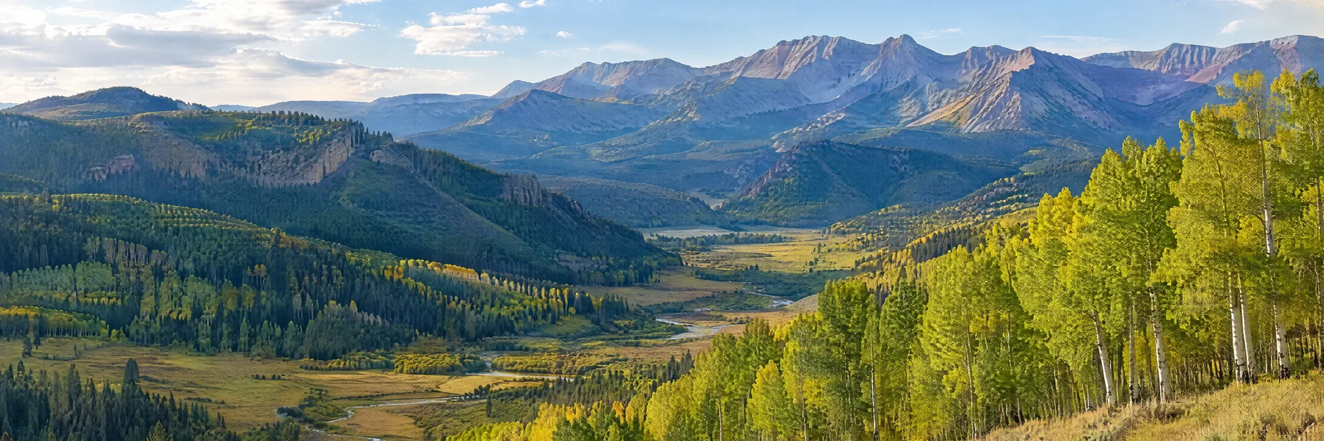 Illustration inspired by Cimarron, CO: western Colorado mountain valley, aspen groves and distant rugged ridges.