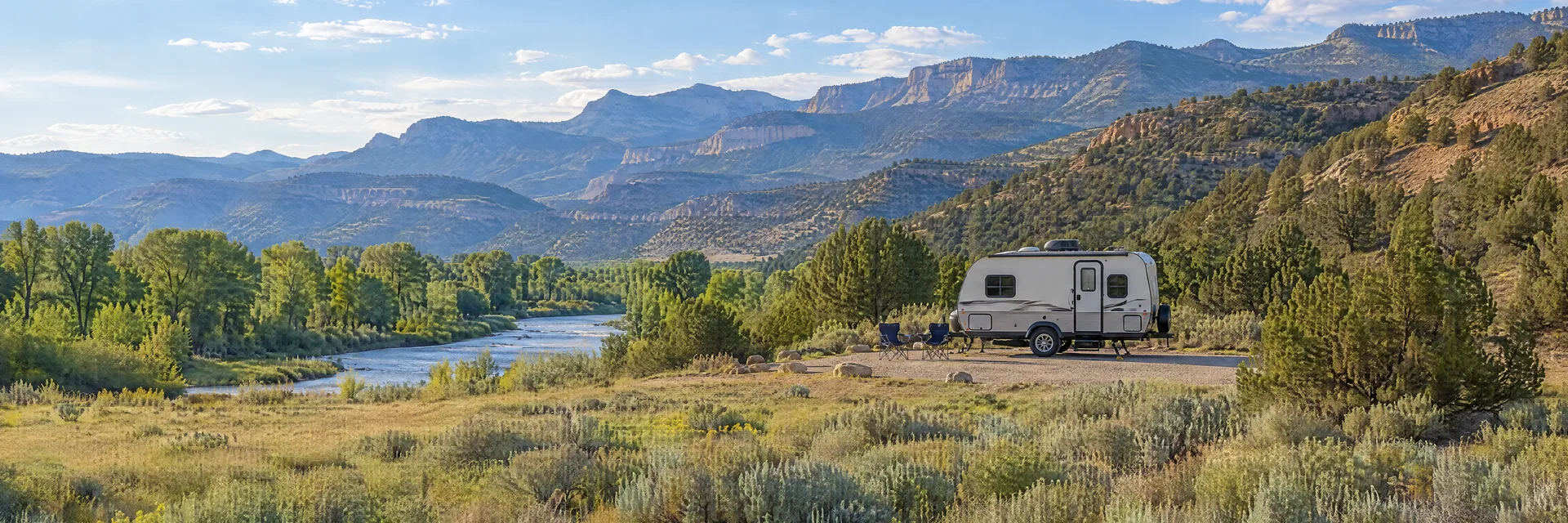 Illustration of a compact travel trailer at a fictional camping setting inspired by Gypsum, CO.