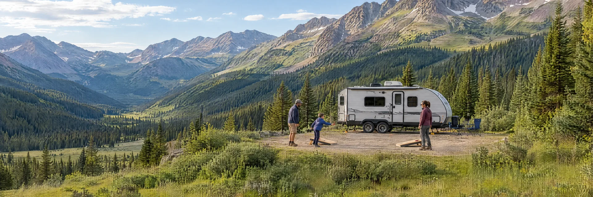 Illustration of campers enjoying family campsite activities beside a compact travel trailer in a fictional camping setting inspired by Ophir, CO.
