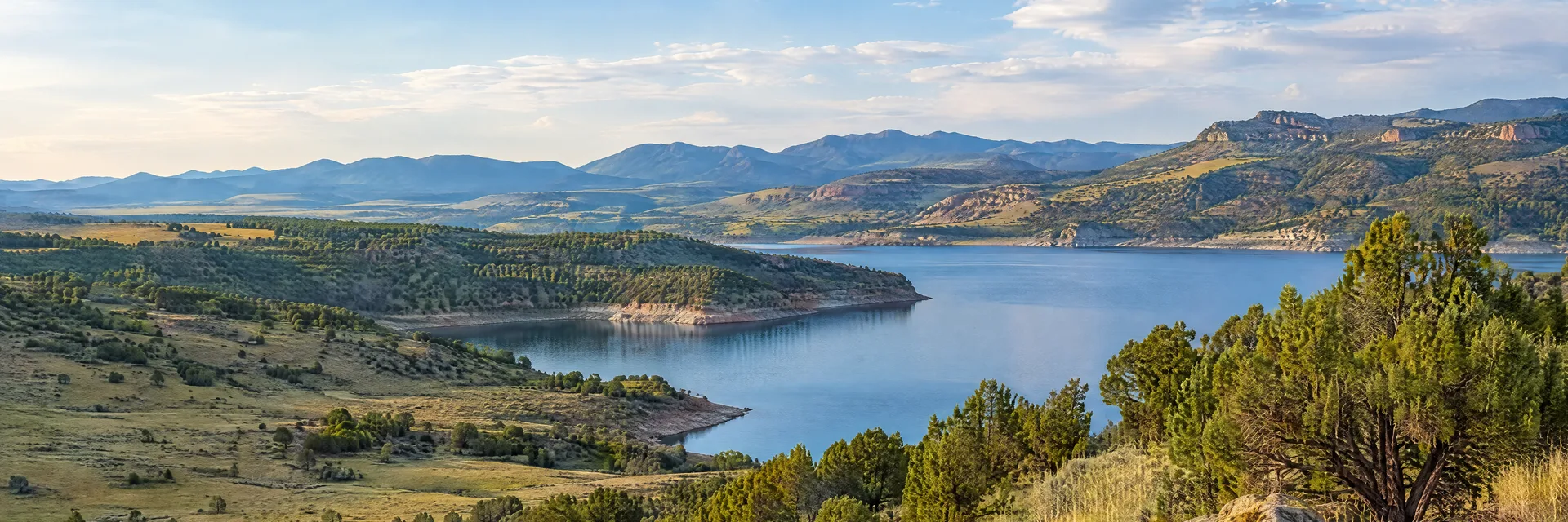 Illustration inspired by Trinidad, CO: southern Colorado grassland foothills, juniper and quiet reservoir.