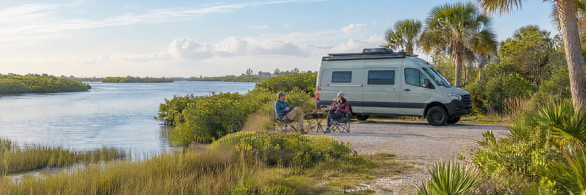 Illustration of campers enjoying morning coffee beside a camper van in a fictional camping setting inspired by Palm Harbor, FL.
