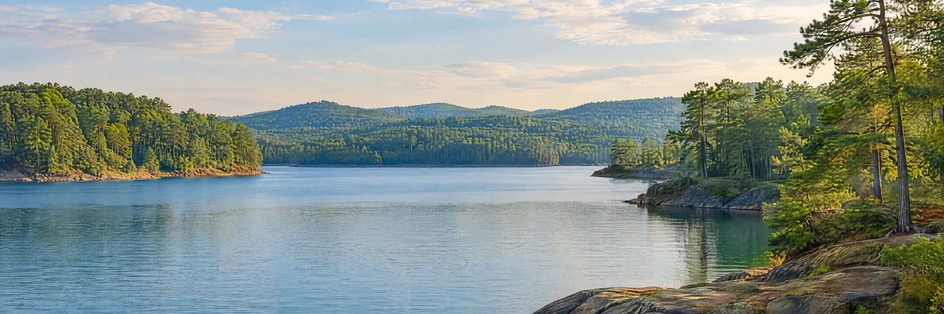 Illustration inspired by Acworth, GA: northwestern Georgia reservoir cove with pine woods and gently rolling green hills.