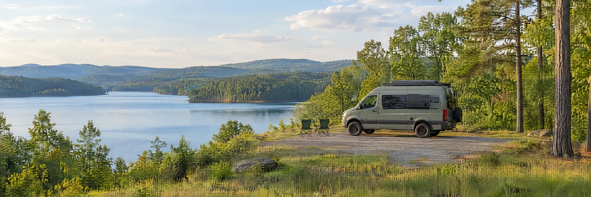 Illustration of a camper van at a fictional camping setting inspired by Atlanta, GA.
