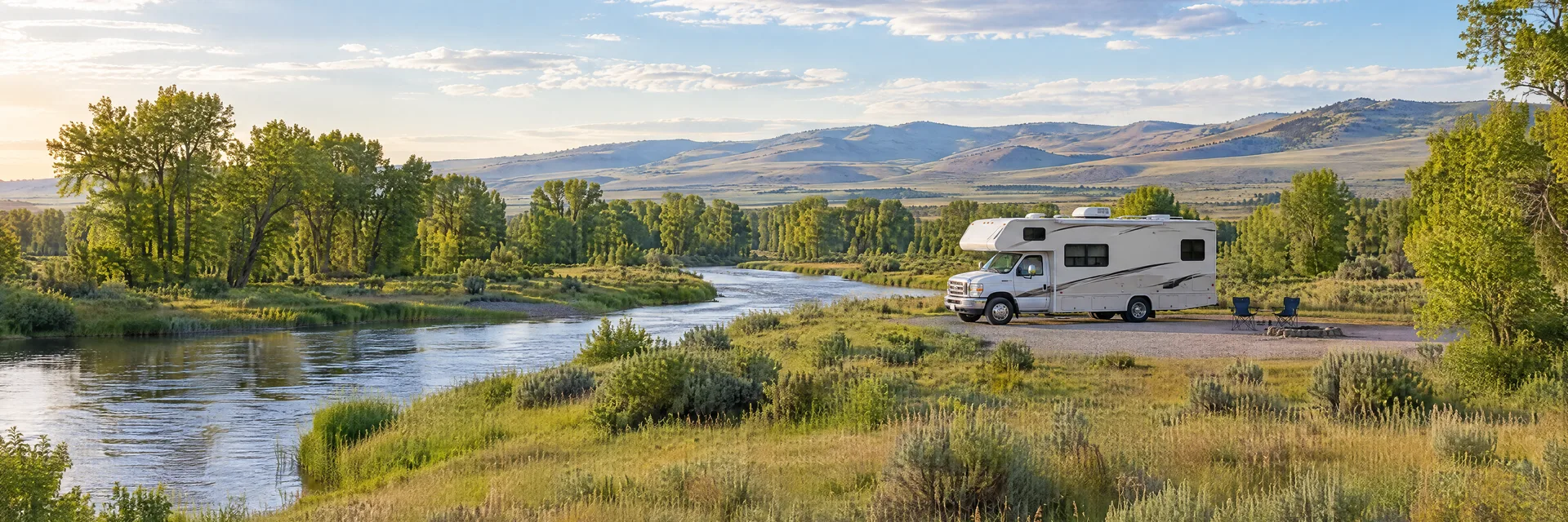 Illustration of a Class C motorhome at a fictional camping setting inspired by Rexburg, ID.