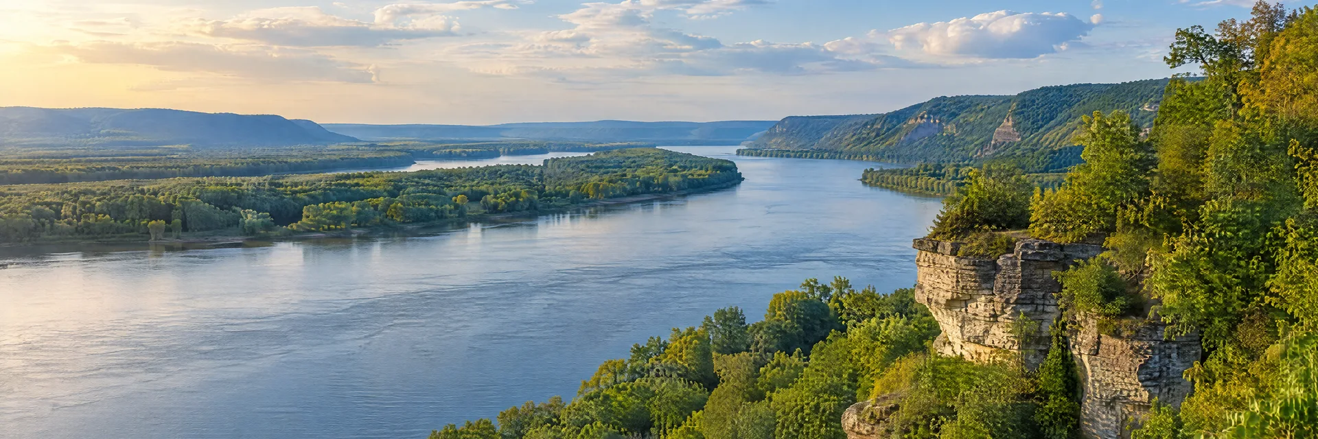 Illustration inspired by Savanna, IL: upper Mississippi river valley, wooded limestone bluffs and broad river channel.