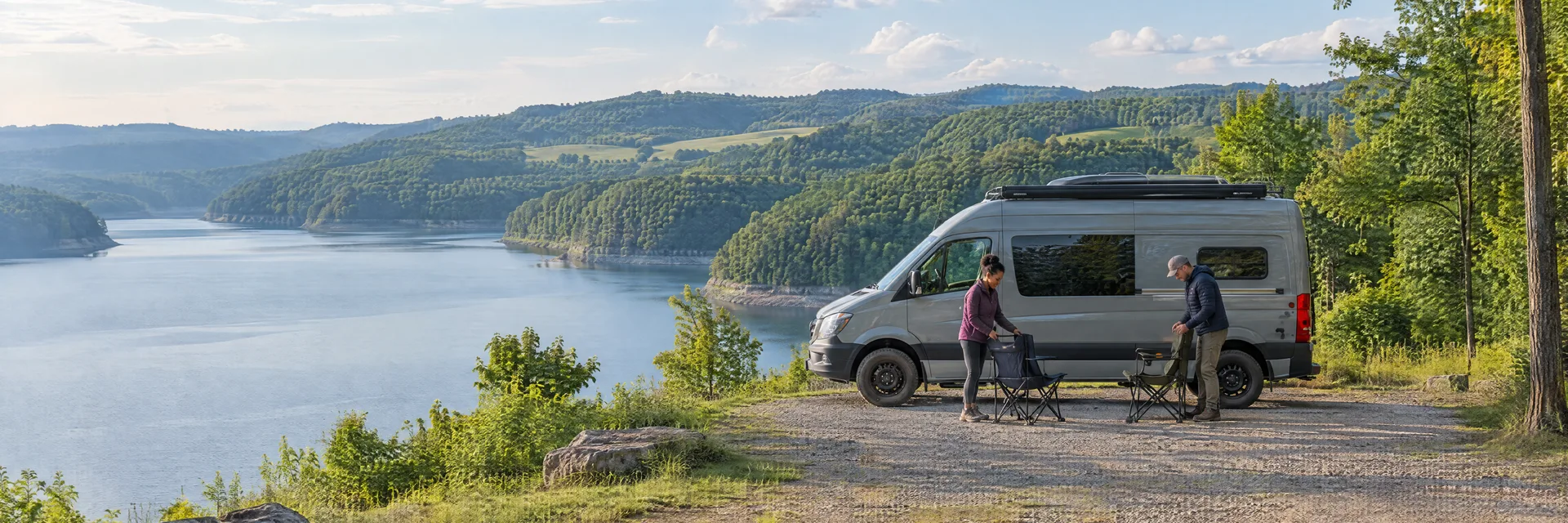 Illustration of campers enjoying setting up camp beside a camper van in a fictional camping setting inspired by Somerset, KY.