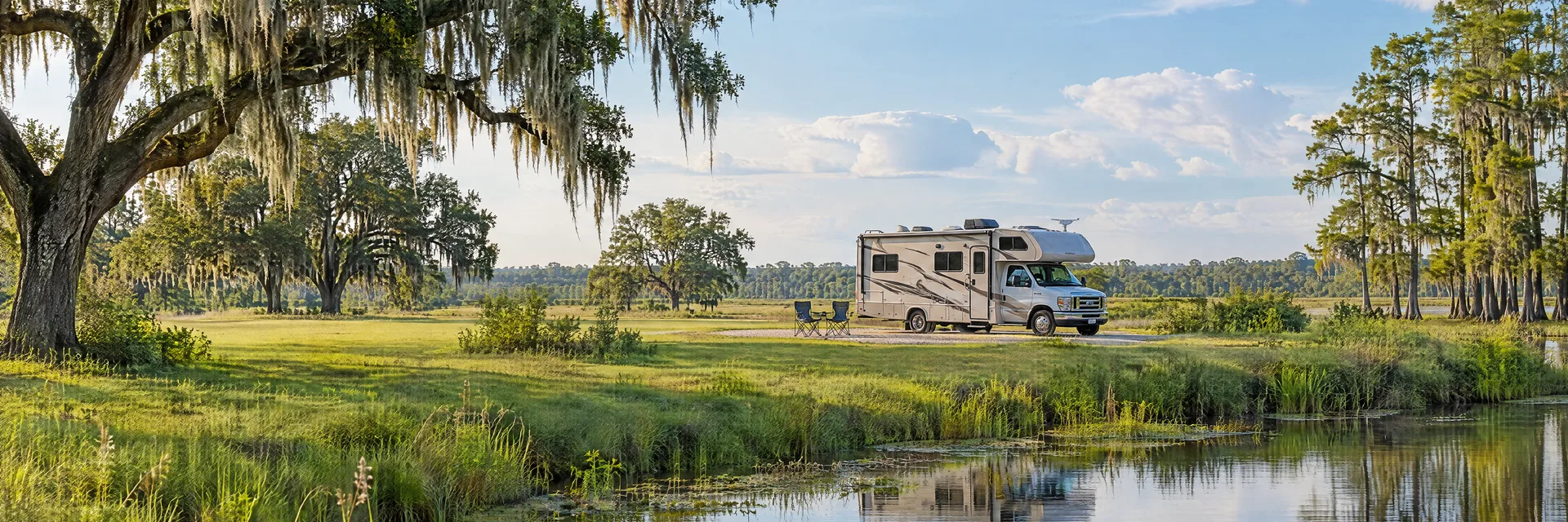 Illustration of a Class C motorhome at a fictional camping setting inspired by Scott, LA.