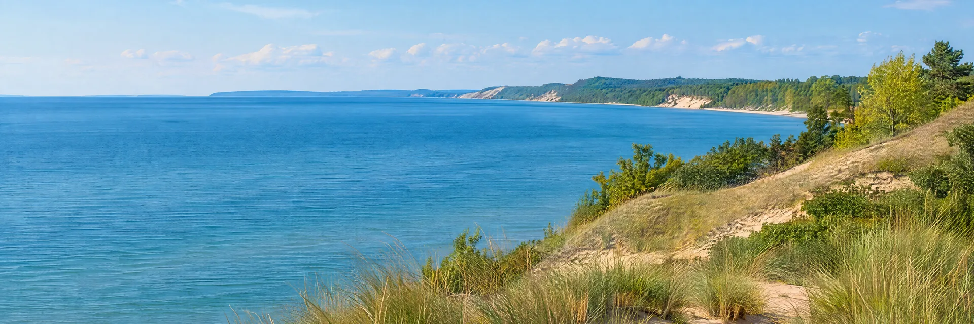 Illustration inspired by Mears, MI: western Michigan dune-country, sandy slopes, dune grass and blue freshwater lake.