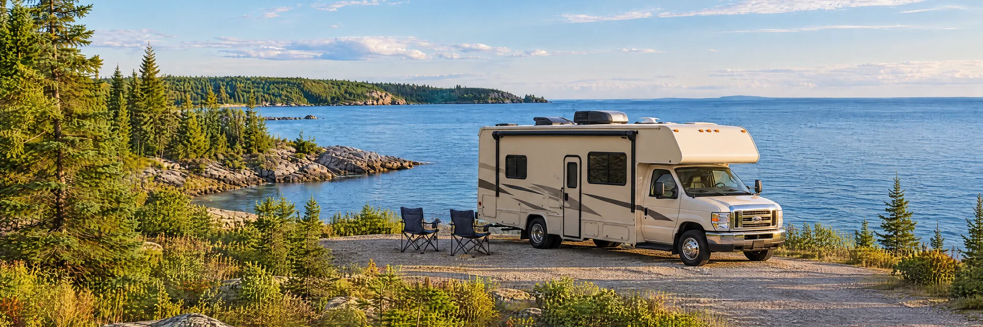 Illustration of a cream Class C motorhome with a modest overcab bunk at a fictional camping setting inspired by St. Ignace, MI.
