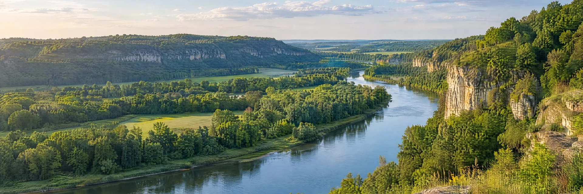 Illustration inspired by Lanesboro, MN: southeastern Minnesota winding river through green limestone bluff country.