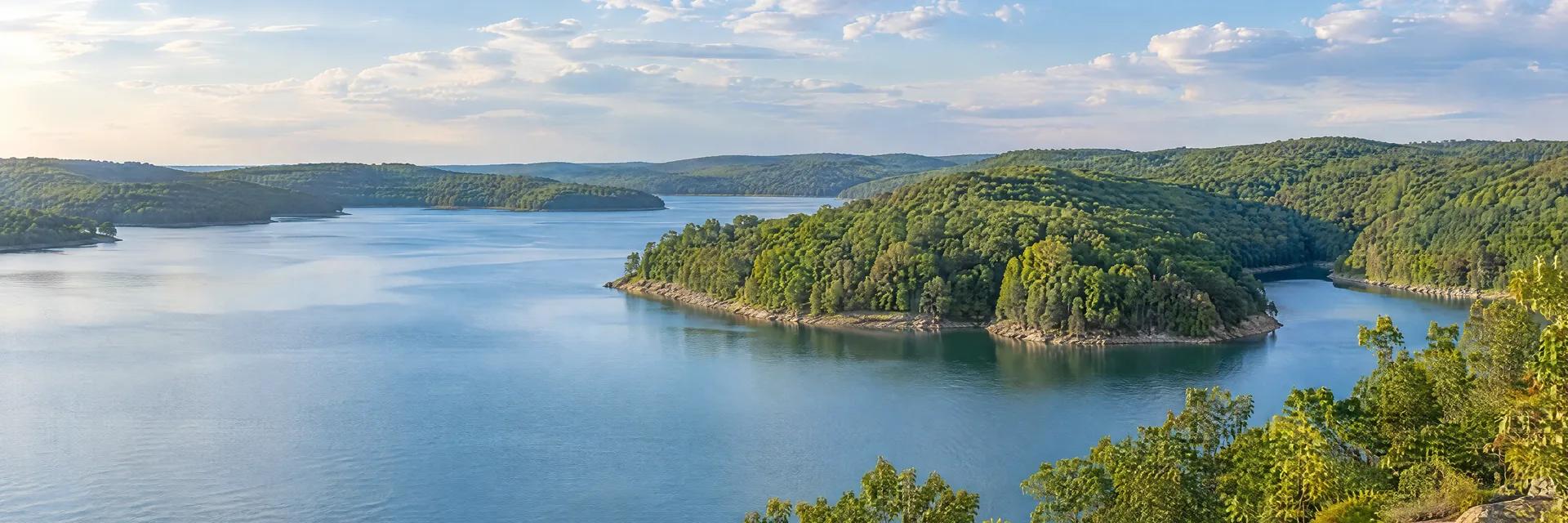 Illustration inspired by Warsaw, MO: broad central Missouri reservoir with wooded rolling hills and quiet sheltered coves.