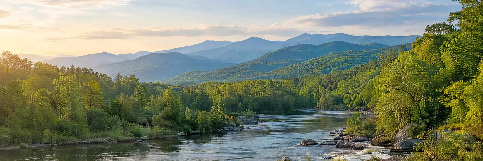 Illustration inspired by Canton, NC: western North Carolina river valley, hardwood woods and layered mountain ridges.