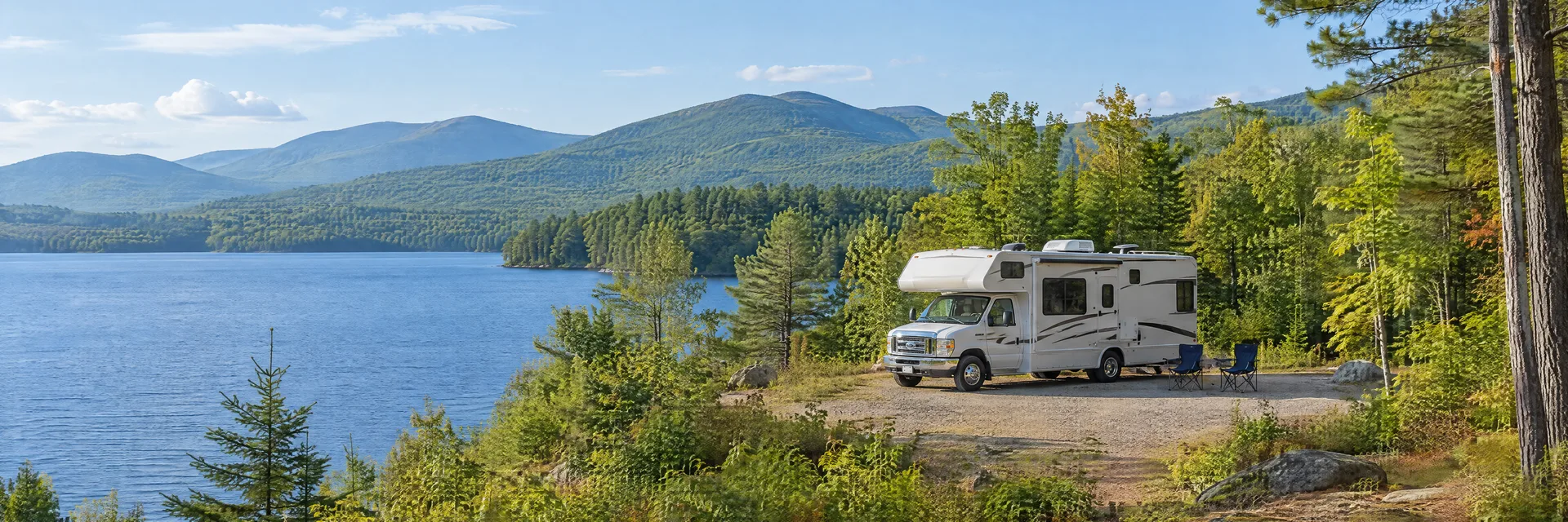 Illustration of a Class C motorhome at a fictional camping setting inspired by Ossipee, NH.