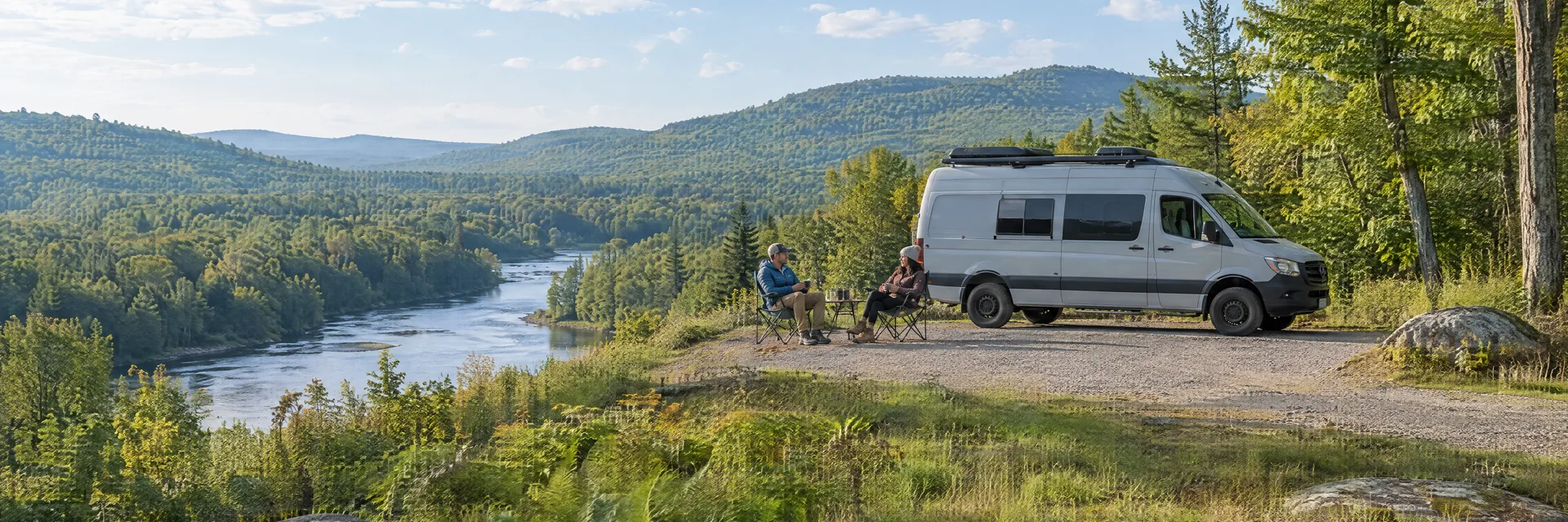 Illustration of campers enjoying morning coffee beside a camper van in a fictional camping setting inspired by Warner, NH.