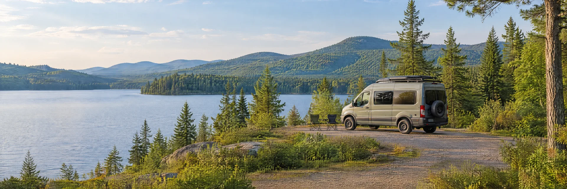 Illustration of a camper van at a fictional camping setting inspired by Tupper Lake, NY.