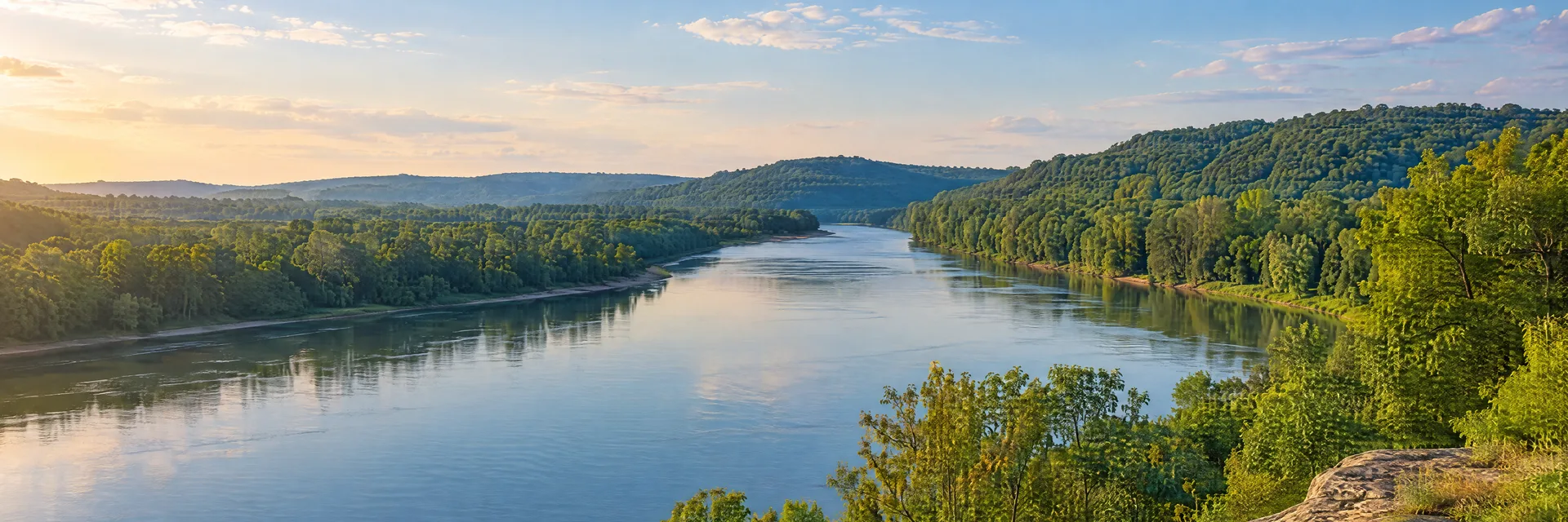 Illustration inspired by Chillicothe, OH: southern Ohio Scioto Valley region, broad gentle river, leafy hardwood banks and softly rounded wooded hills.