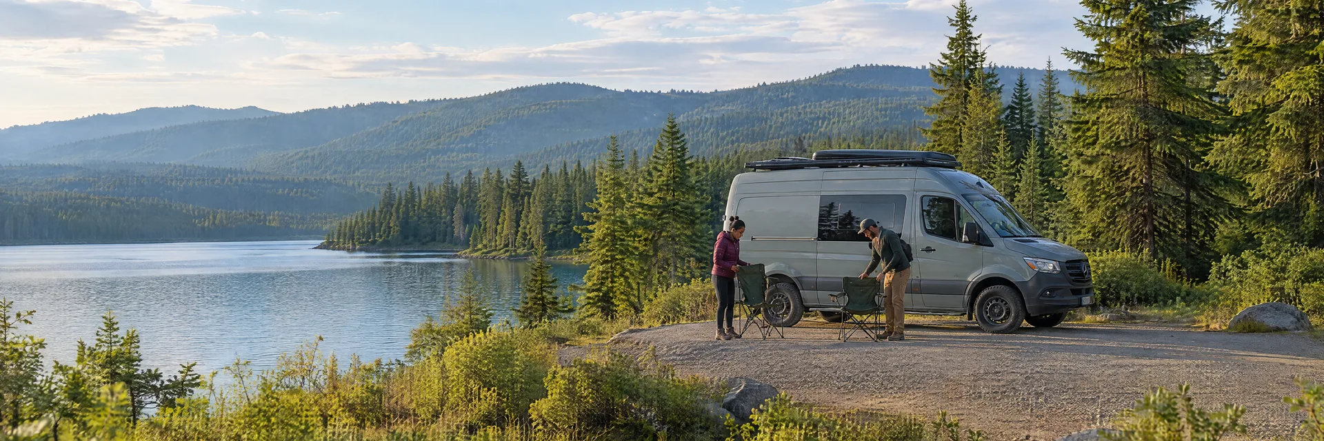 Illustration of campers enjoying setting up camp beside a camper van in a fictional camping setting inspired by Mt. Hood, OR.