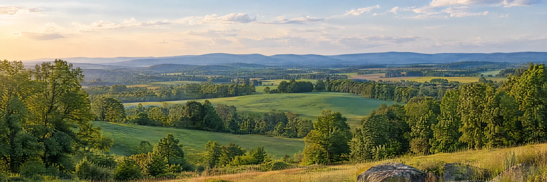 Illustration inspired by Gettysburg, PA: pennsylvania rolling green farmland and hardwood groves, no monuments or battlefield camping.
