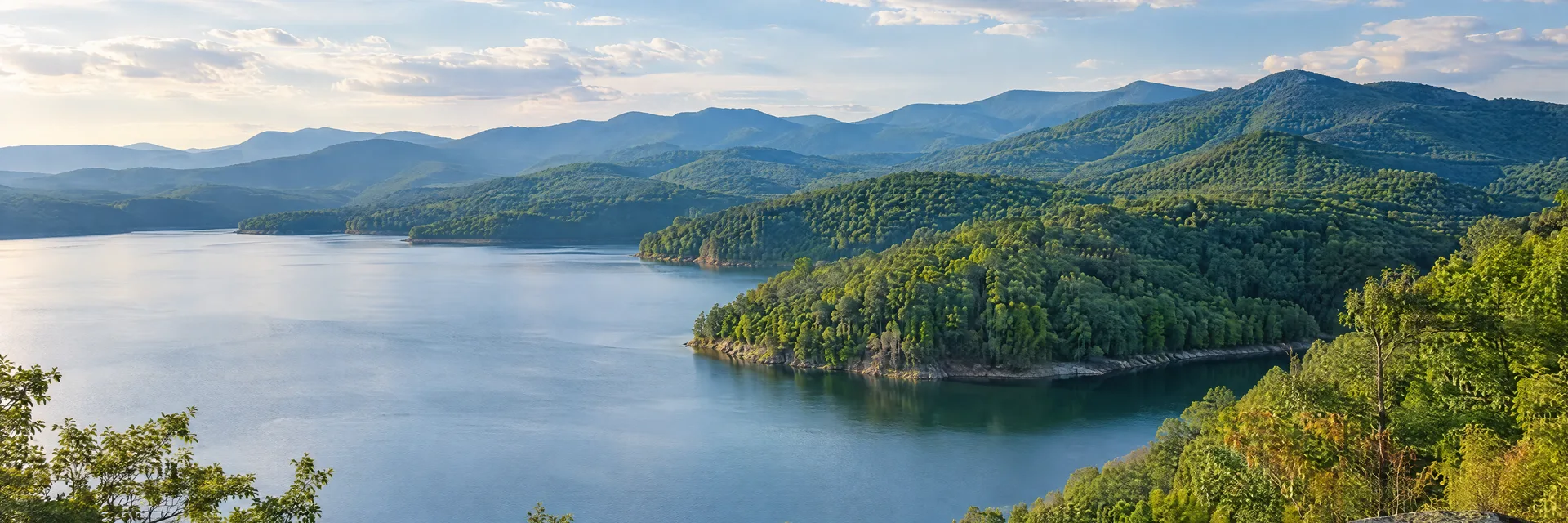 Illustration inspired by Bristol, TN: northeastern Tennessee lake cove with green Appalachian ridges.