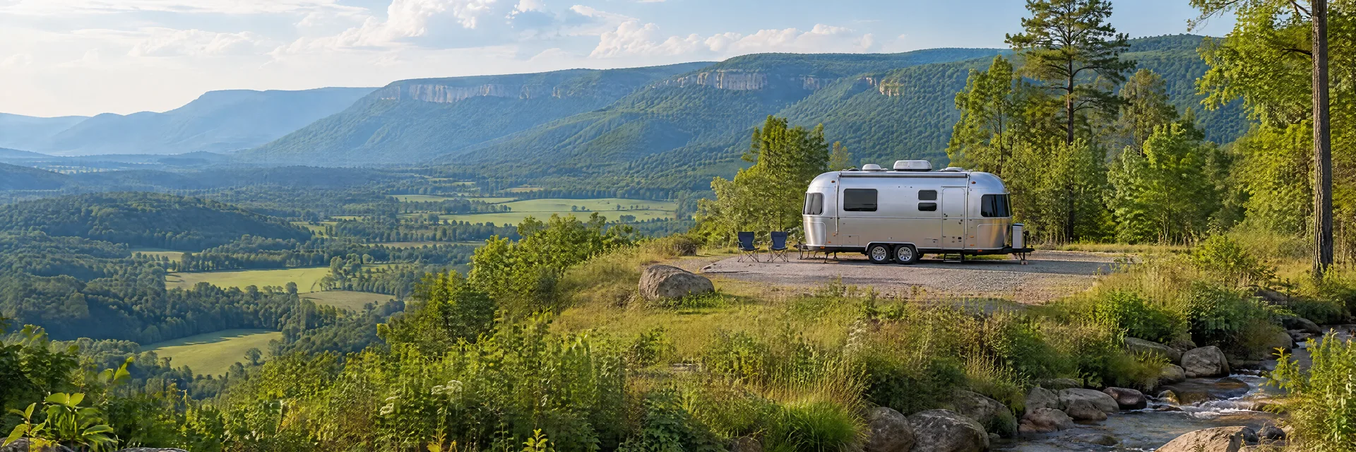 Illustration of a rounded silver travel trailer at a fictional camping setting inspired by Pikeville, TN.