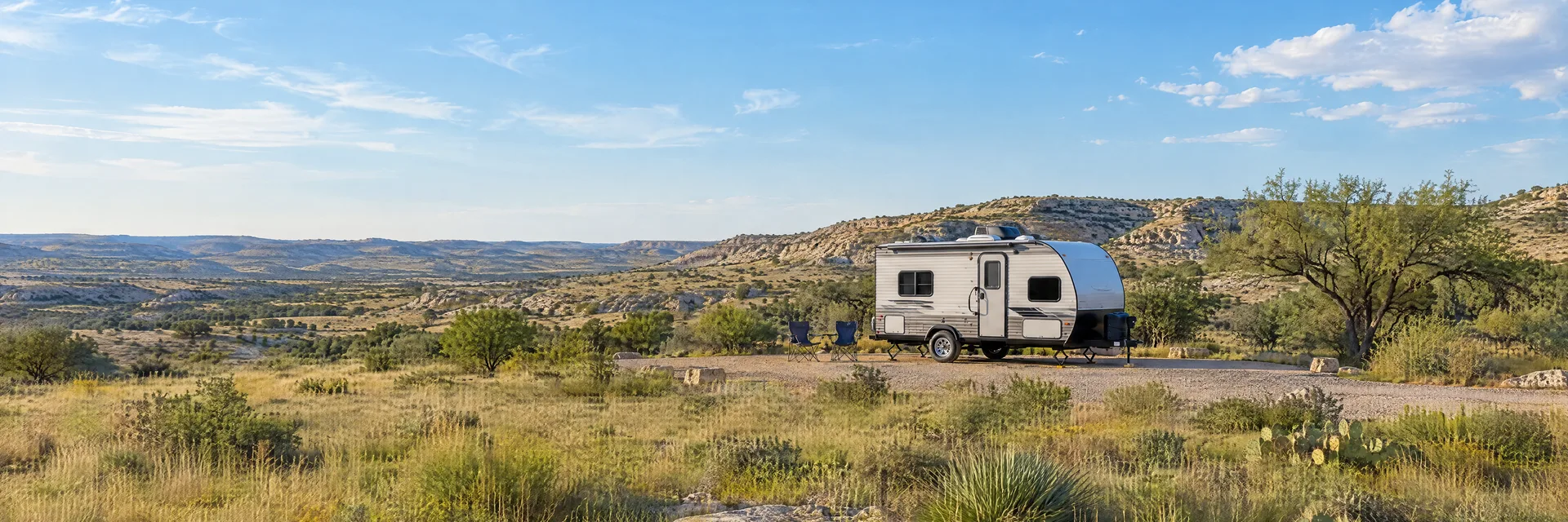 Illustration of a compact travel trailer at a fictional camping setting inspired by Big Spring, TX.