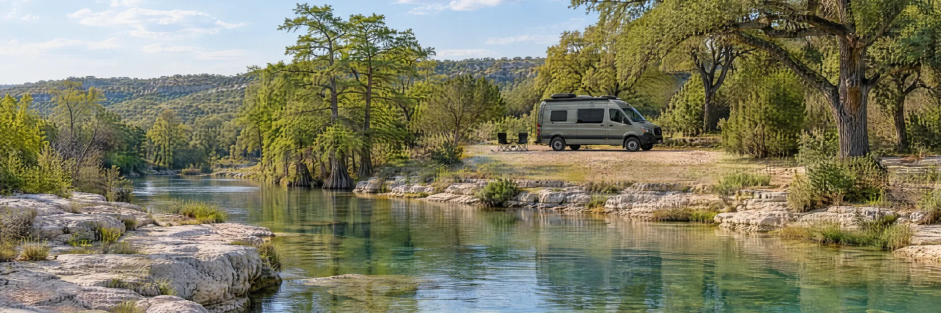 Illustration of a camper van at a fictional camping setting inspired by BLANCO, TX.