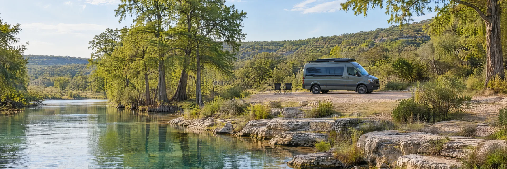 Illustration of a camper van at a fictional camping setting inspired by Center Point, TX.