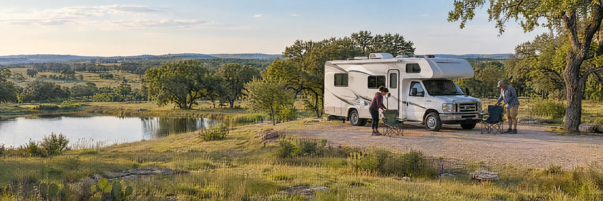 Illustration of campers enjoying setting up camp beside a Class C motorhome in a fictional camping setting inspired by Comanche, TX.