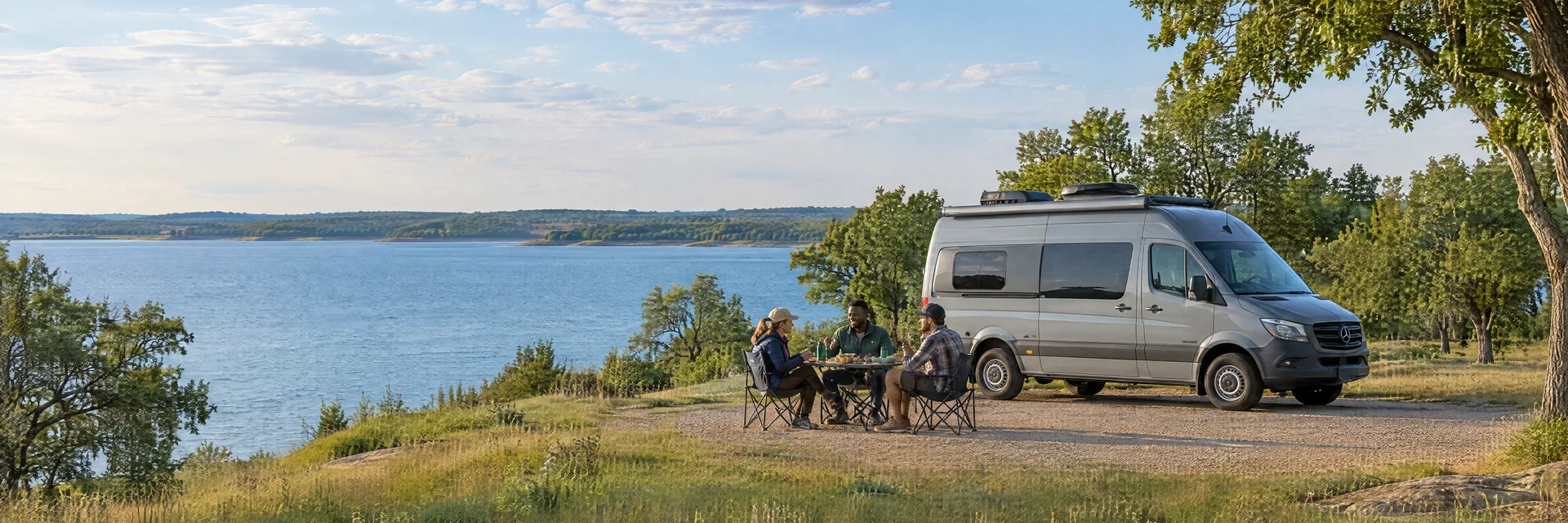 Illustration of campers enjoying an outdoor meal beside a camper van in a fictional camping setting inspired by Hickory Creek, TX.