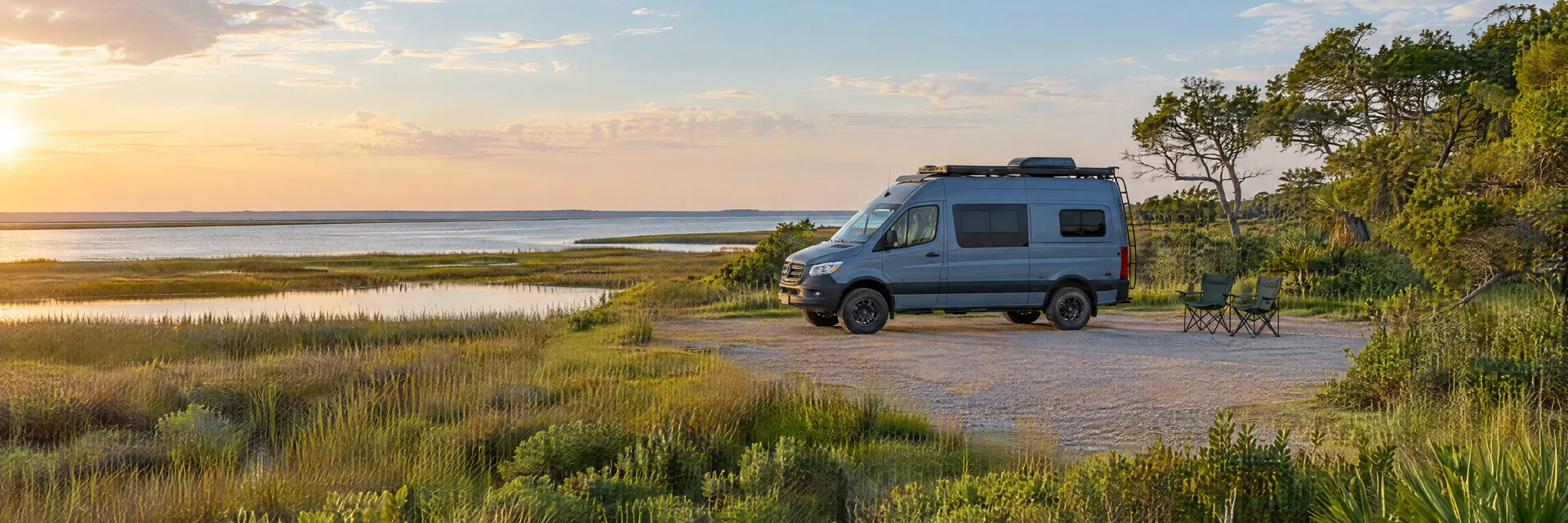 Illustration of a camper van at a fictional camping setting inspired by Hitchcock, TX.