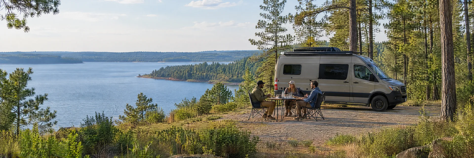 Illustration of campers enjoying an outdoor meal beside a camper van in a fictional camping setting inspired by JASPER, TX.