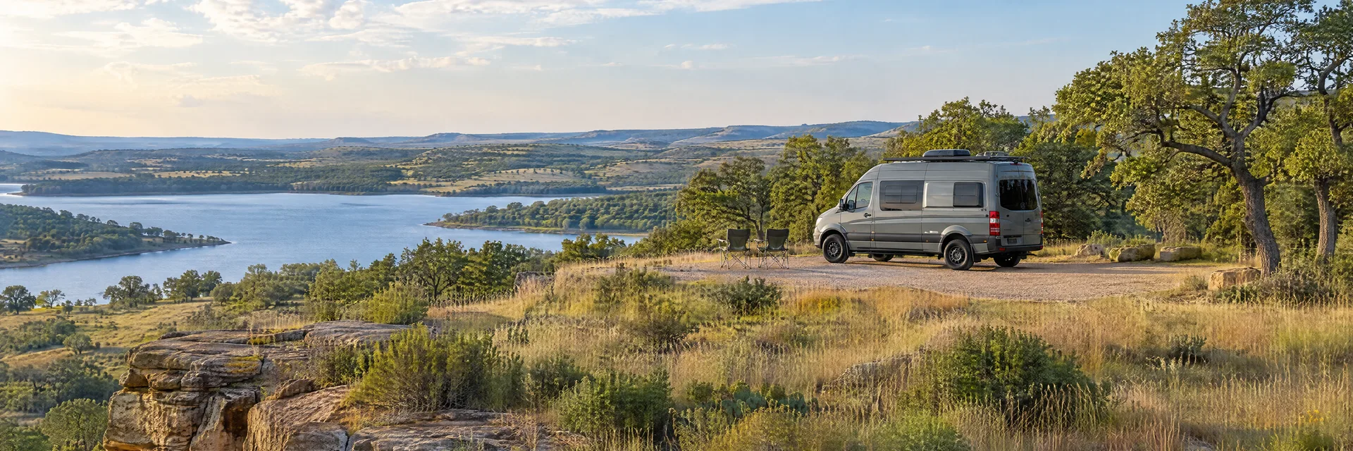 Illustration of a camper van at a fictional camping setting inspired by Mineral Wells, TX.
