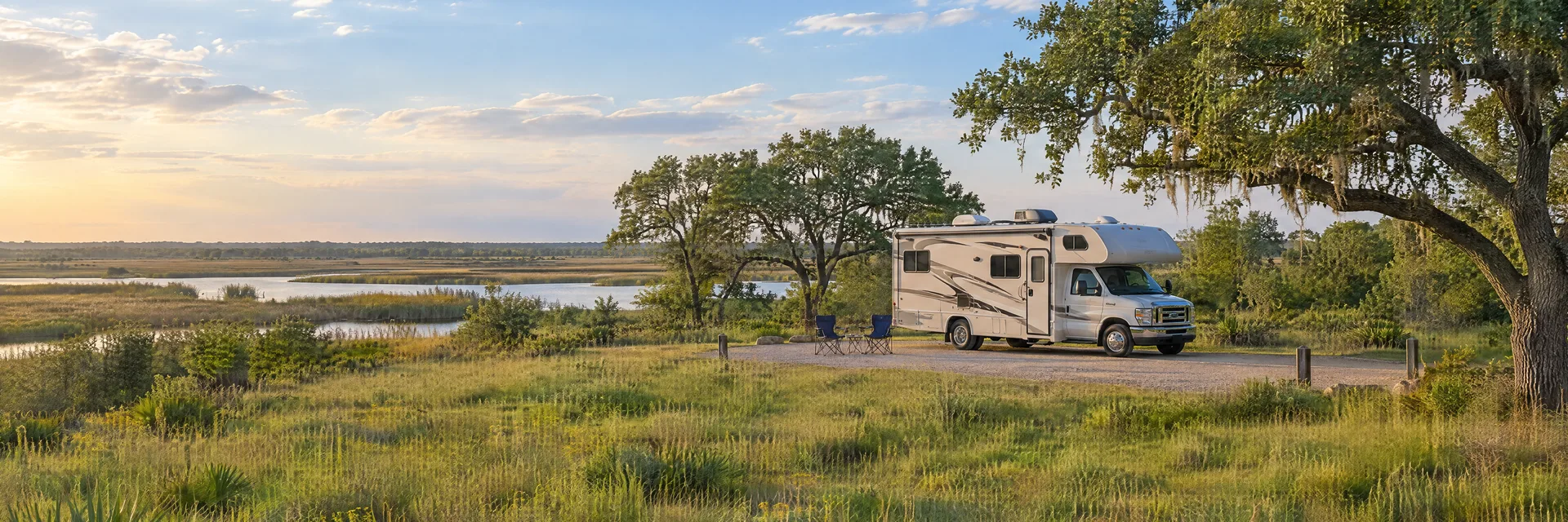 Illustration of a Class C motorhome at a fictional camping setting inspired by Pearland, TX.