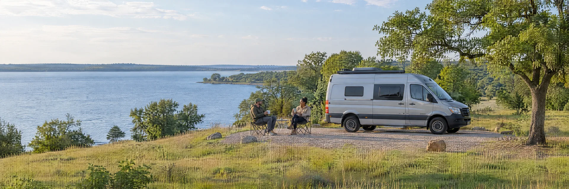 Illustration of campers enjoying morning coffee beside a camper van in a fictional camping setting inspired by Princeton, TX.