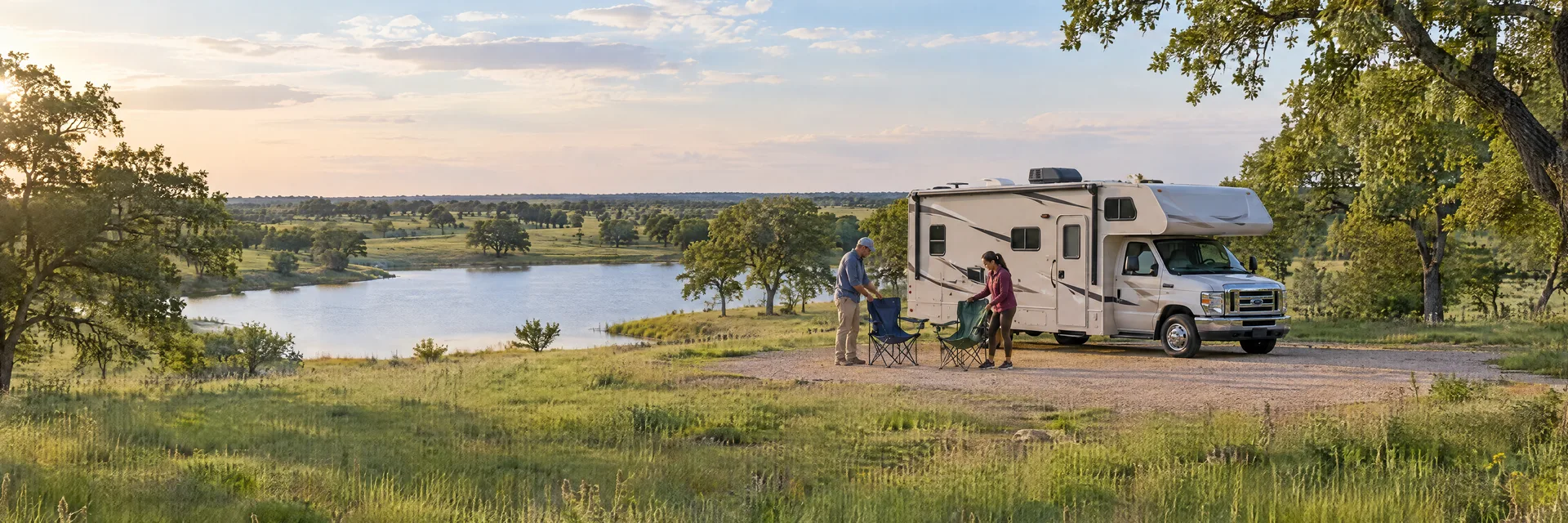 Illustration of campers enjoying setting up camp beside a Class C motorhome in a fictional camping setting inspired by Terrell, TX.