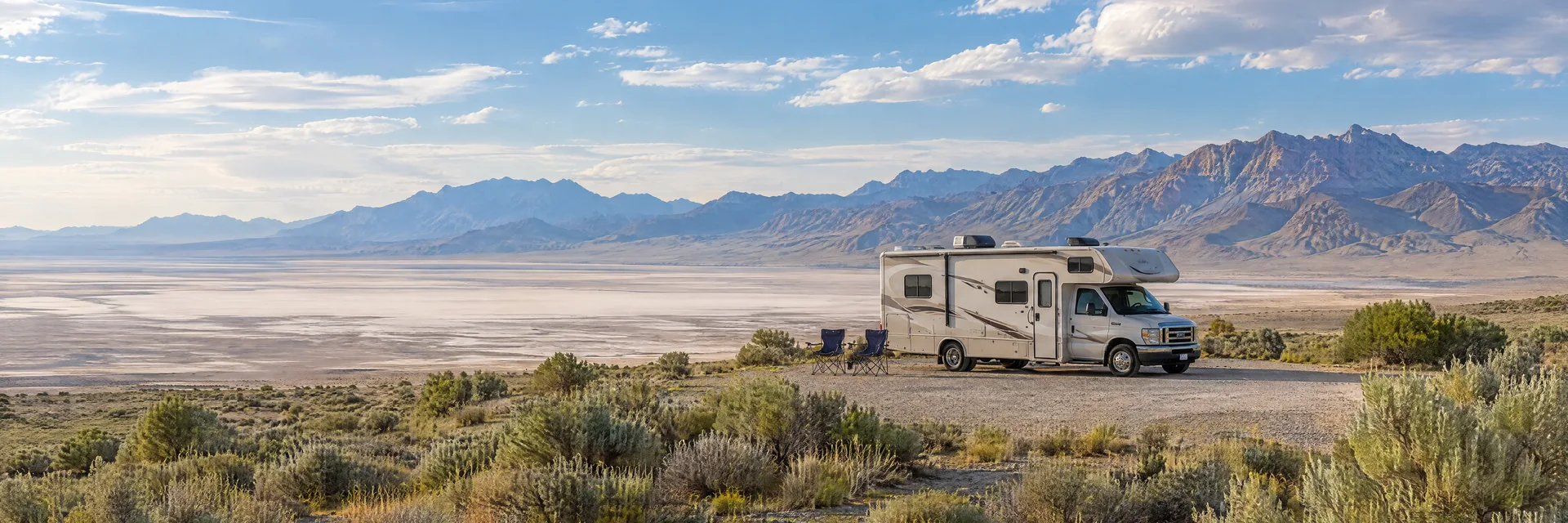 Illustration of a Class C motorhome at a fictional camping setting inspired by Dugway, UT.