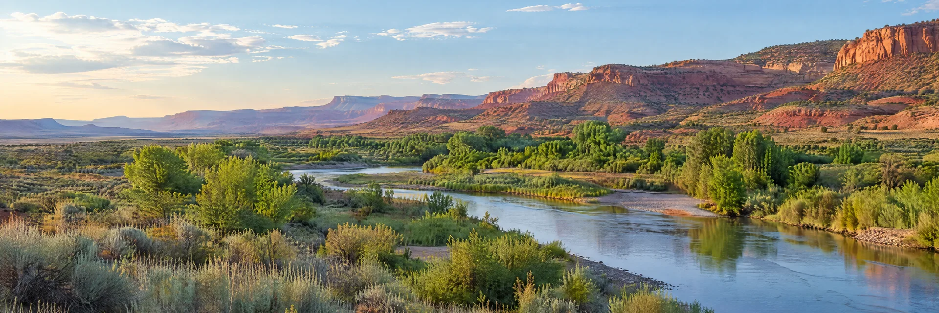 Illustration inspired by Hatch, UT: southern Utah open river valley, sagebrush and distant reddish cliffs, no iconic national park formations.