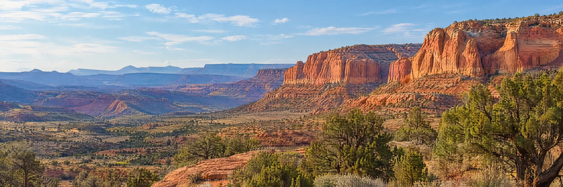 Illustration inspired by KANAB, UT: southern Utah high desert, red sandstone cliffs, sagebrush and scattered juniper; no invented arch.