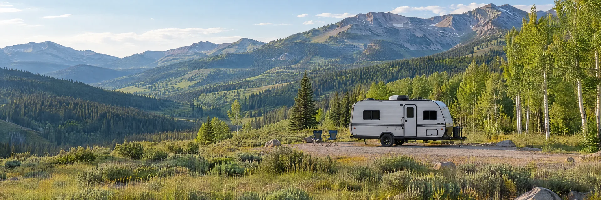 Illustration of a compact travel trailer at a fictional camping setting inspired by Park City, UT.